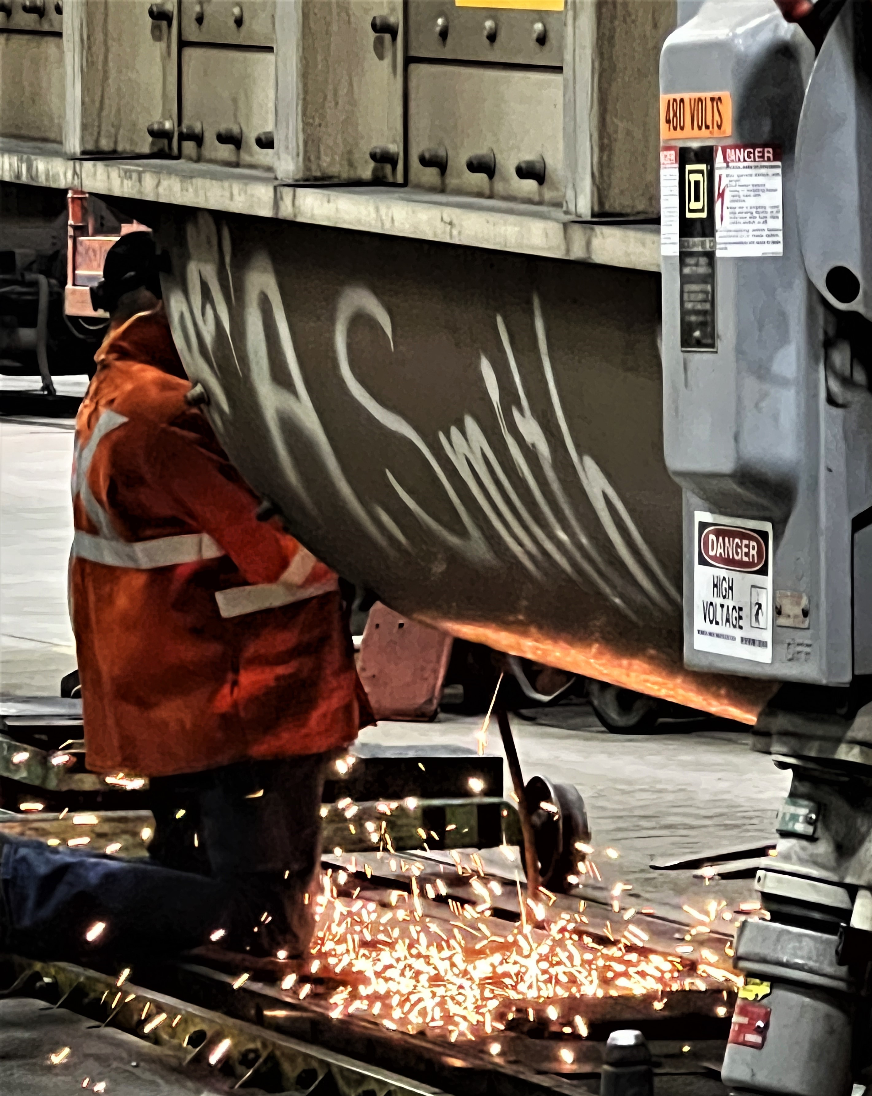 LiDAR documentation of the facility's massive maintenance bays with locomotives in active use.