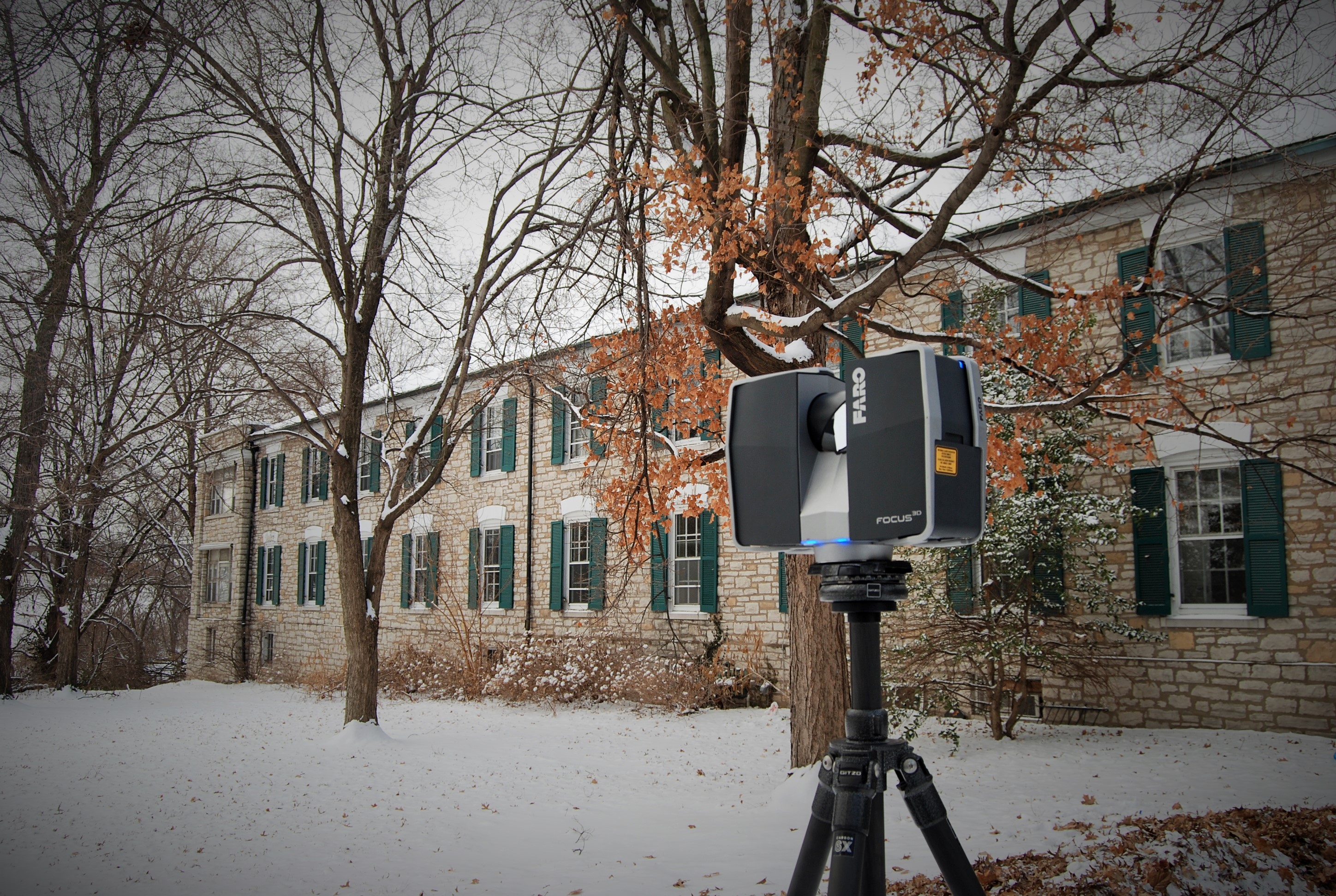 A FARO scanner documents the exterior of the historic Charless Place.