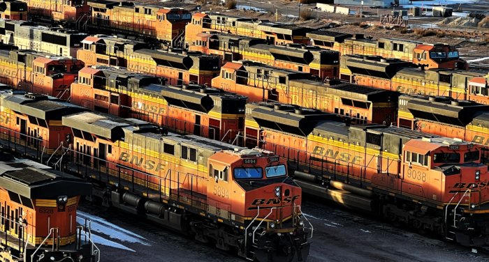 Rail yard filled with locomotives outside BNSF maintenance facility.